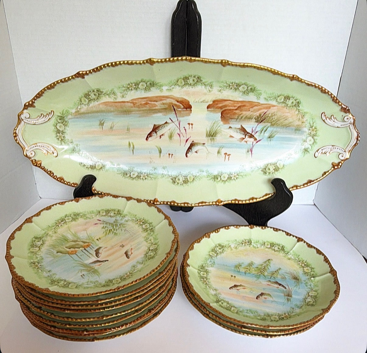D11 - Limoge Fish Dishes - 12 plates - 1 Platter
