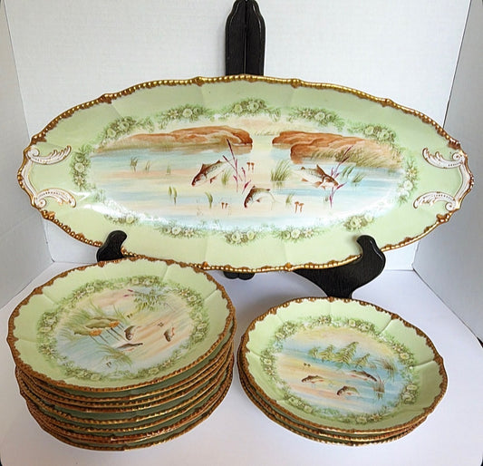 D11 - Limoge Fish Dishes - 12 plates - 1 Platter