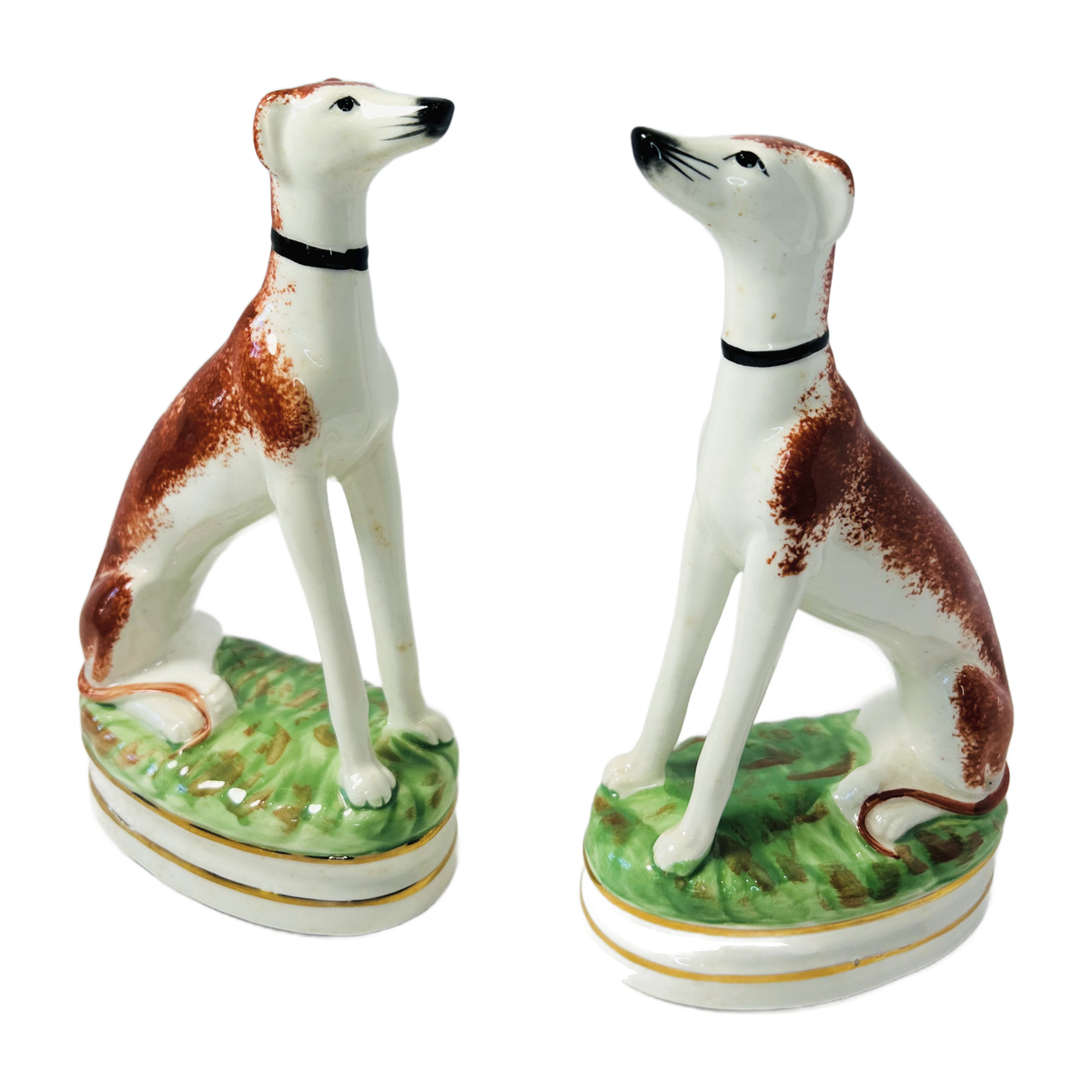 H1 - Pair of Staffordshire Style Whippet Figures – Seated Greyhound Dogs on Grassy Bases